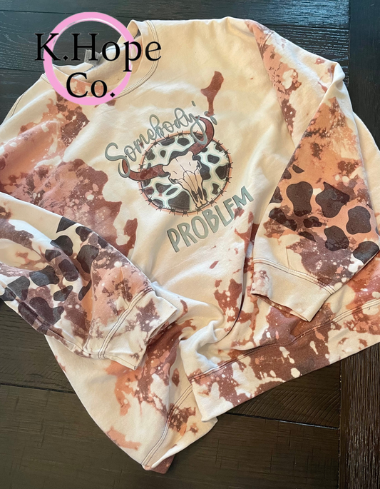 Custom cowhide “Somebody’s Problem” Crewneck